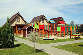 Holiday home in Ustronie Morskie with a playground